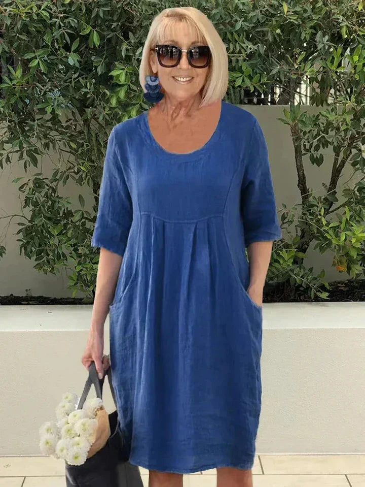 Stylisches Atmungsaktives Frauenkleid Mit Tasche | Midi